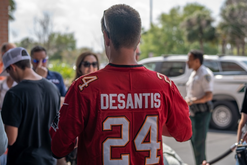 A red jersey with DeSantis 24 written on it.