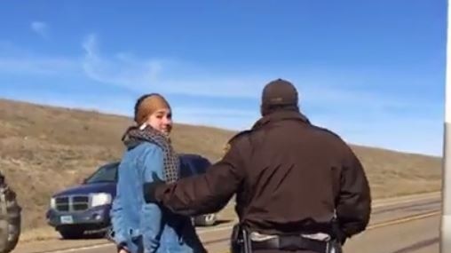 Shailene Woodley being led away by police