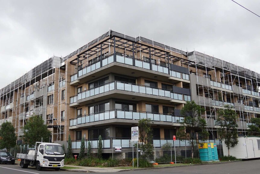 The Lidcombe apartment building which lost its roof in a storm earlier this year.