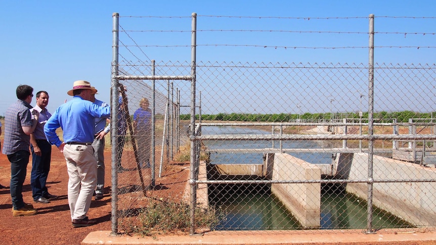 KAI personnel and politicians view the M1 channel of the Ord irrigation project