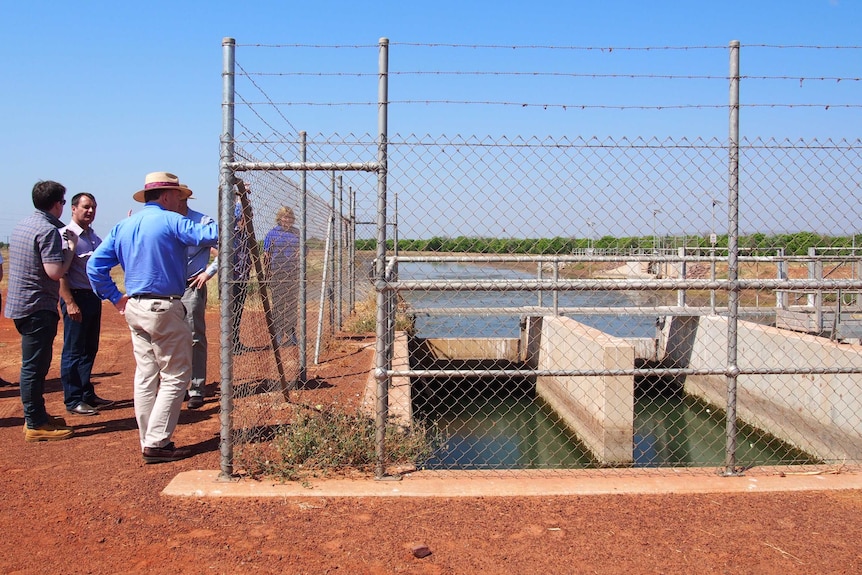 KAI personnel and politicians view the M1 channel of the Ord irrigation project