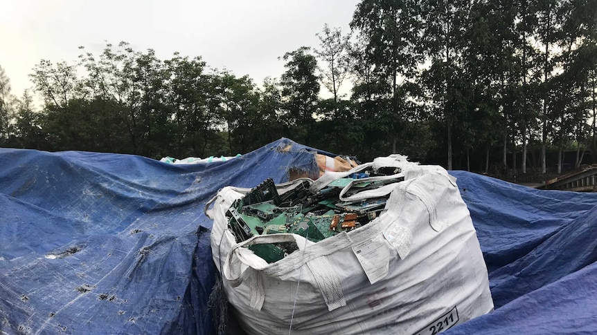 Bags of circuit boards at an alleged e-waste recycling facility in Thailand