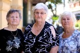 Rose Kruger, Philomena Hall and Patricia Wenman standing shoulder to shoulder on Fremantle street