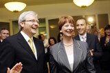 Kevin Rudd and Julia Gillard arrive for the first Labor government caucus meeting