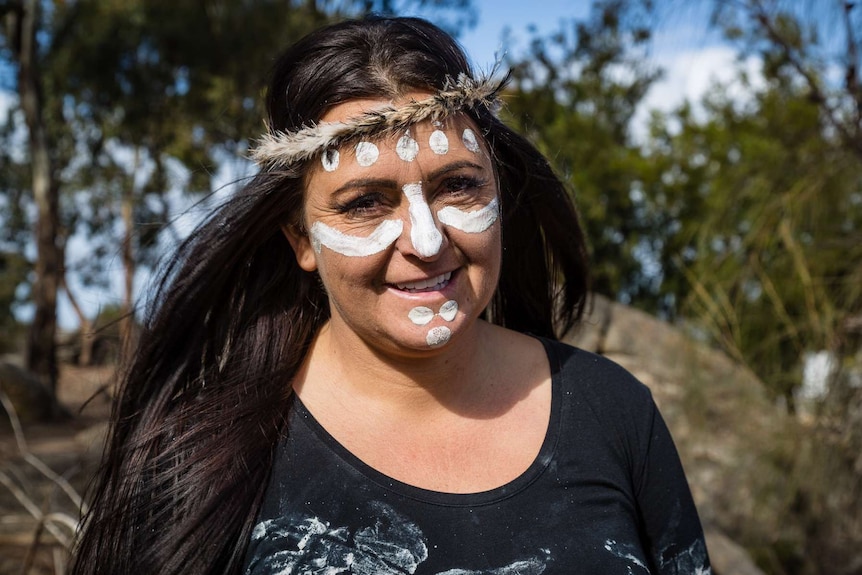 Wadawurrung traditional owner Corrina Eccles with white ochre on her face.