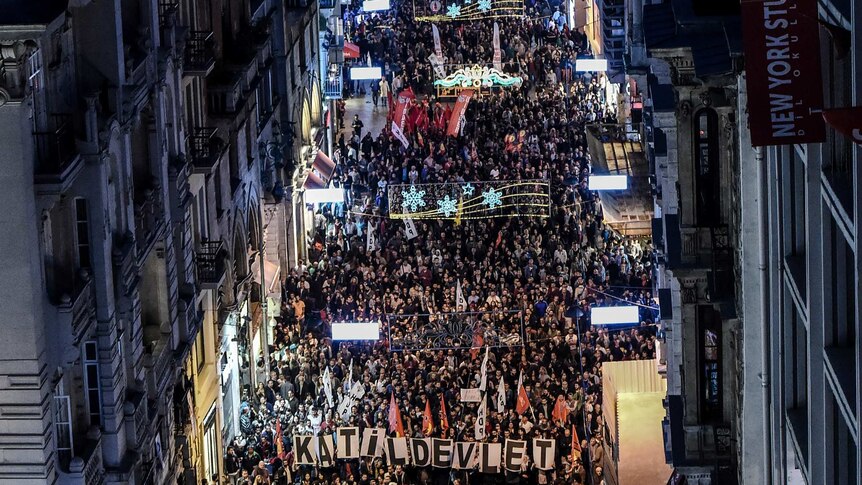 Protestors march against the bombing in Ankara