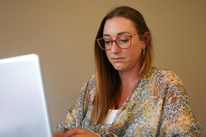 A woman at a computer