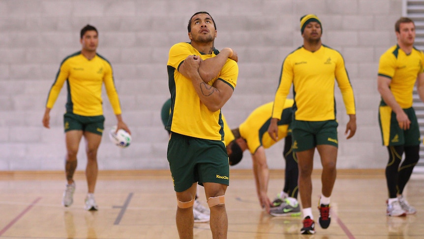 Digby Ioane stretches during Wallabies indoor training session