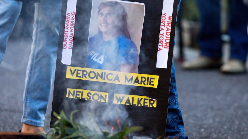 A poster with a photo of Veronica Nelson wearing a blue t-shirt