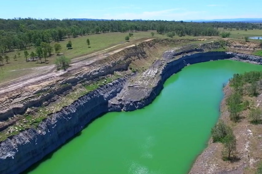 Bright green coloured water in pits at Ebenezer Mine near Ipswich.