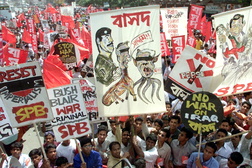 Bangladeshi students march during an anti-war rally in Dhaka.