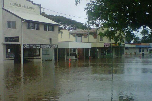Localised flooding has cut the north Queensland town of Ingham in half.