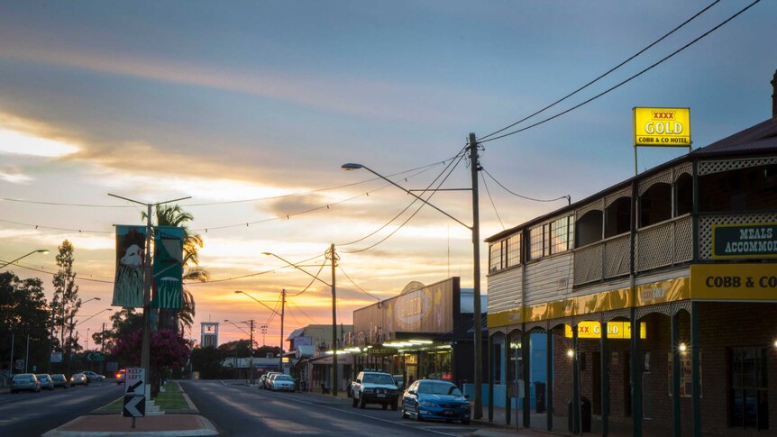 The main street of St George in southern Queensland at sunset featuring the Cobb and Co pub on the corner, June 2020.