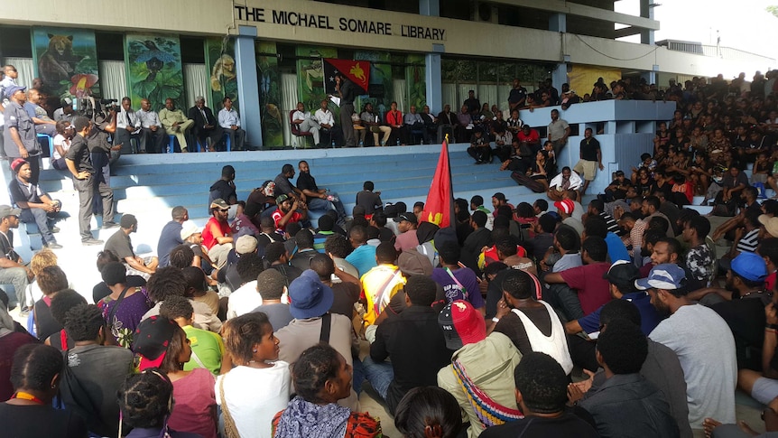 Student protesters at the University of PNG holding a sit-in at the library