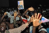 'We don't feel so small': Kenyans celebrate in Kisumu after the inauguration ceremony of US President Barack Obama.