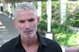 Craig Foster speaks with the media in Bangkok.