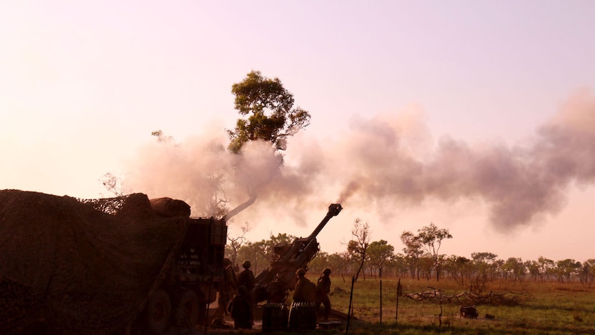 Australian soldiers and US Marines take part in a live fire training exercise