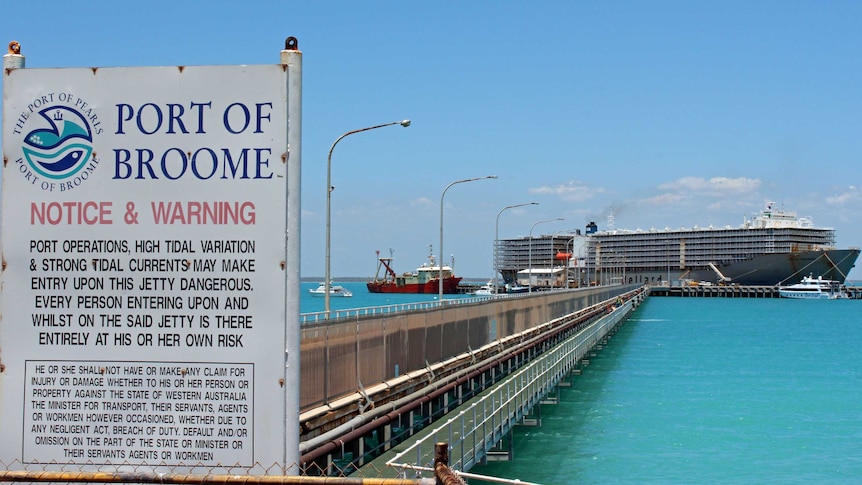 A Port of Broome sign with a live export ship in the background. November 2015