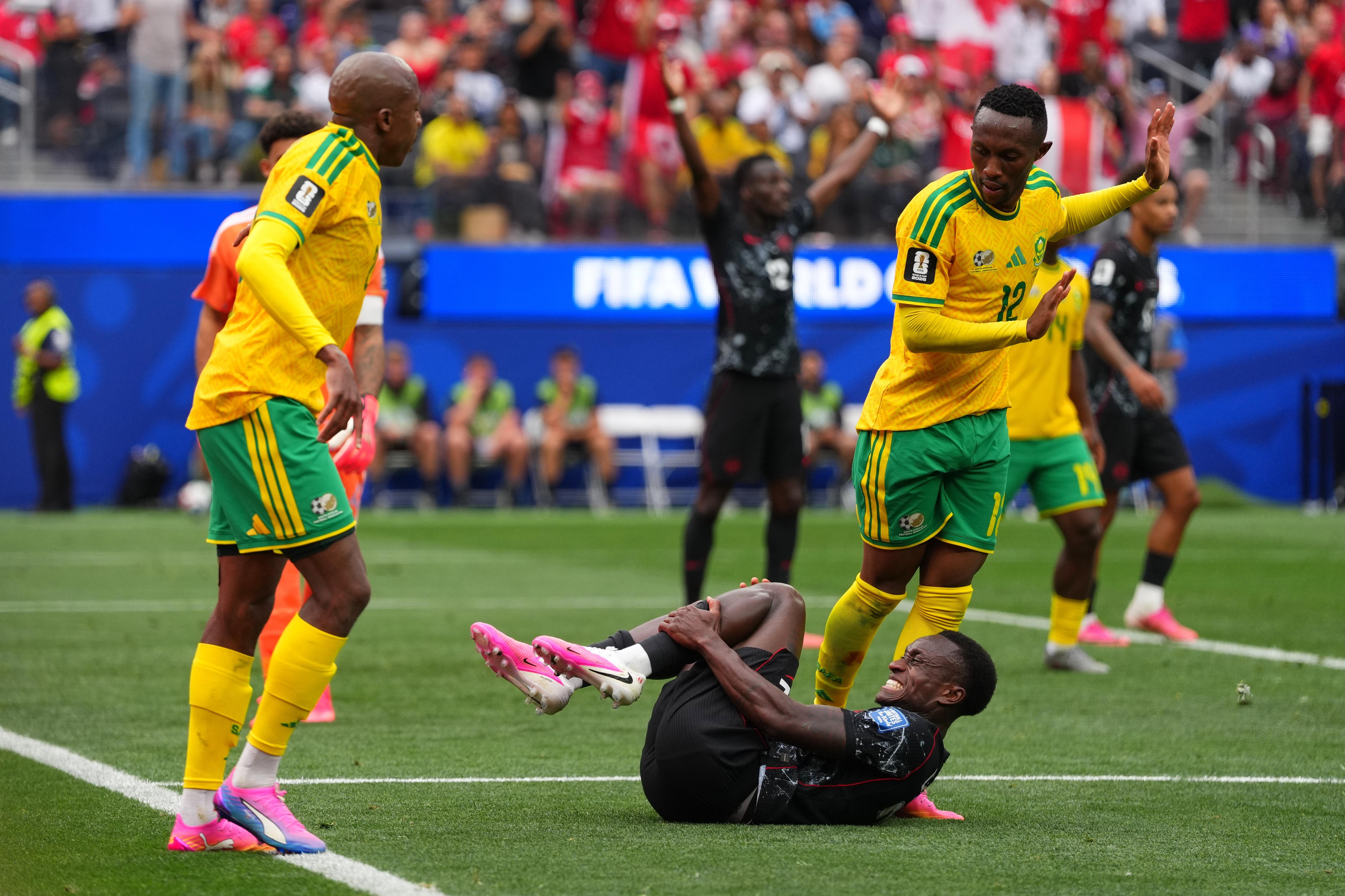 Richie Laryea lays on the grass