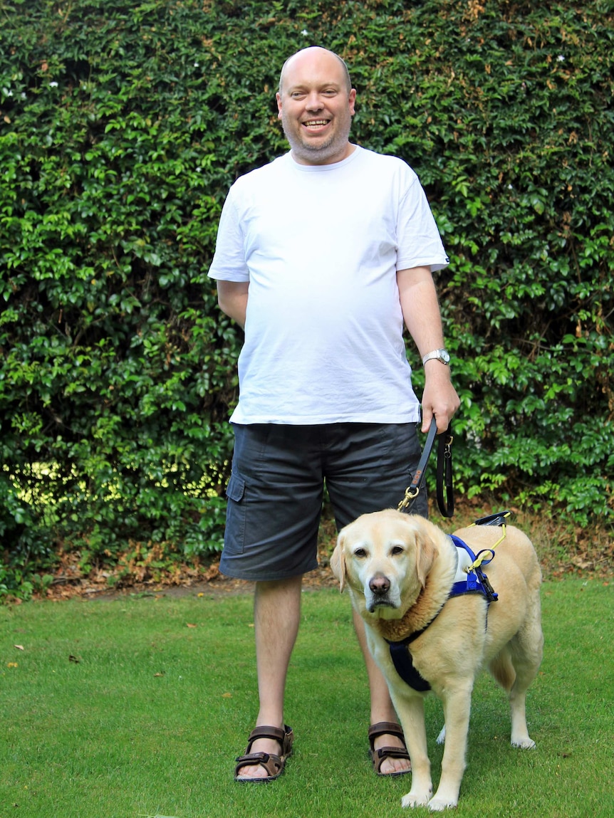 Dale Reardon with his guide dog Charlie