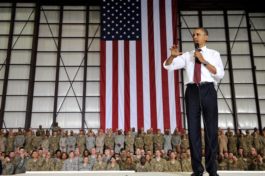 Barack Obama speaks to troops at Bagram Air Field during a surprise visit to Afghanistan.