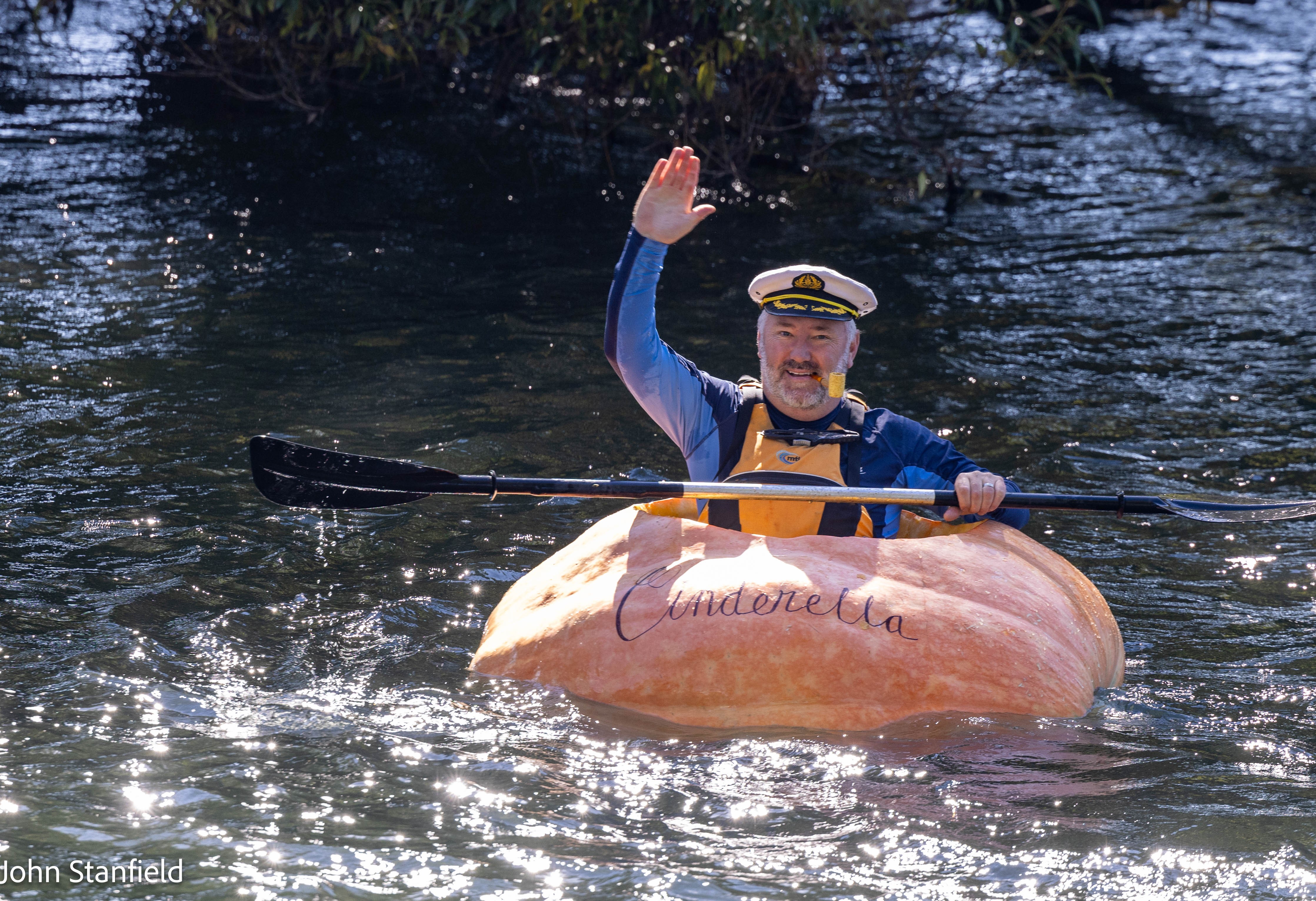 Giant pumpkin paddler Adam quite possibly the first person to float in one  down Tumut River - ABC News