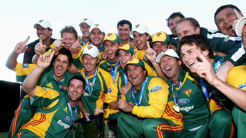 Singing in the rain... the Tasmanian Tigers crowned one-day domestic champions.