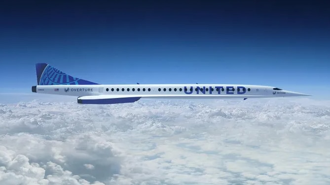 An artist's impression of a Boom Overture jet in United Airlines livery flying above the clouds.