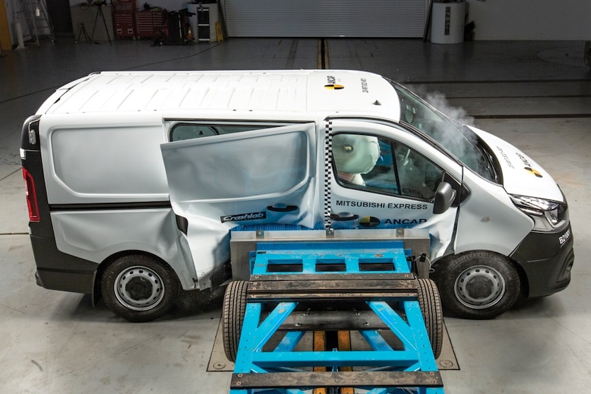 A trolley smashes into the side of a van.