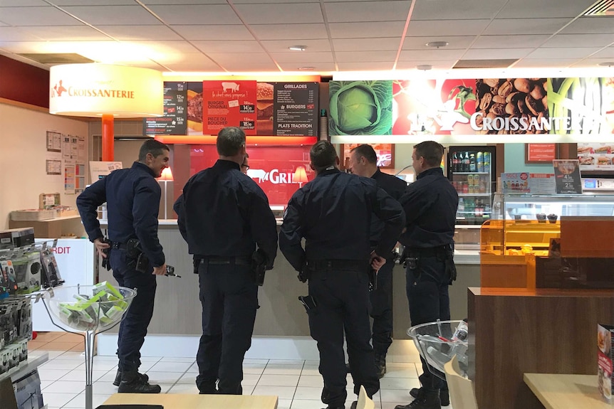 French police in Calais gas station