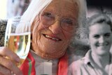 Tasmanian 100yo Kathleen Golder enjoys a wine, with inset image of a younger Kathleen
