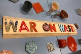 Colourful etters made from recycled plastic that spell out 'War on Waste'.