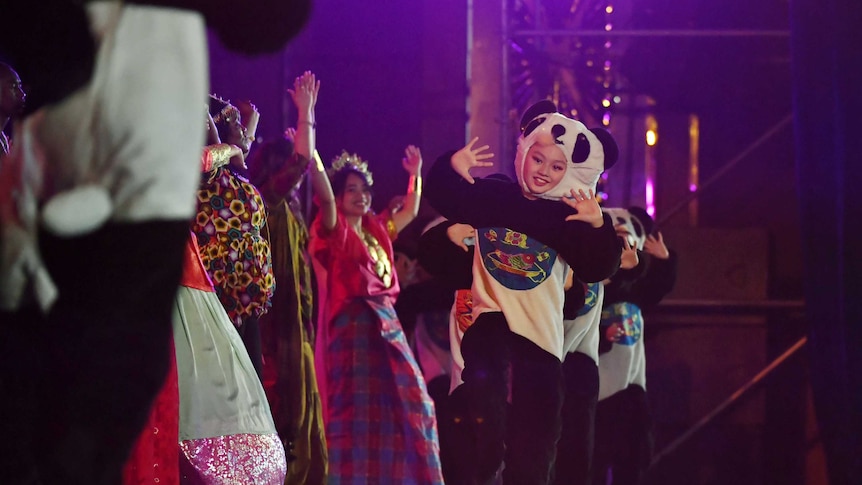 People in costumes perform onstage at the 13th Confucius Institute Conference in Chengdu