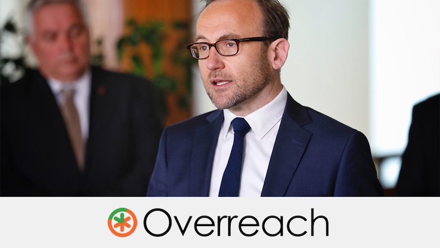 Greens leader Adam Bandt talking. The verdict underneath is "overreach" with a green and orange asterisk