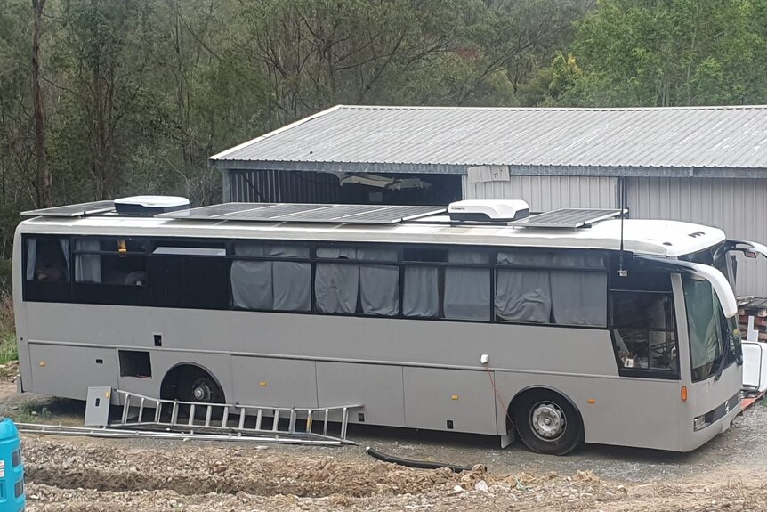 Bus parked near shed