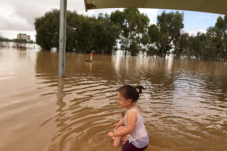 The Western River in Winton broke its banks, creating a new playground for the local children.