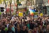 Austrians march down Vienna's main shopping street