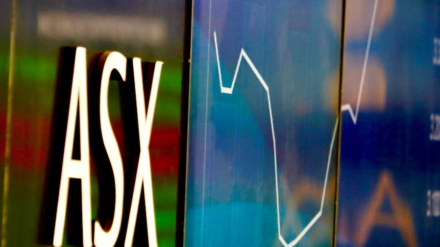 ASX logo and chart on a board at the stock exchange in Sydney.