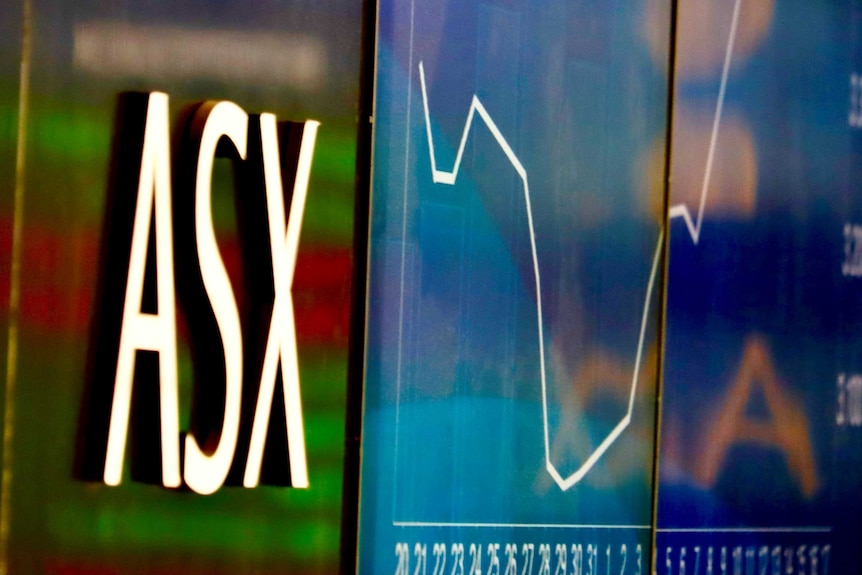 ASX logo and chart on a board at the stock exchange in Sydney.
