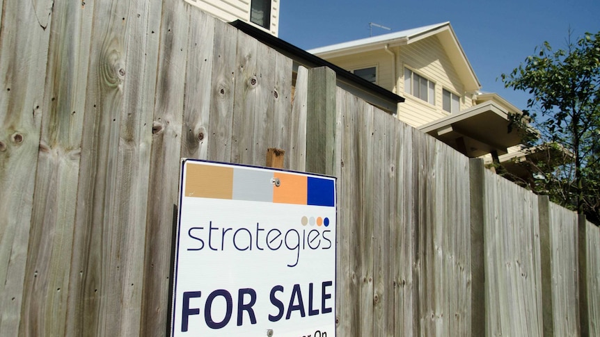 A 'For Sale' sign (Strategies) in Brisbane