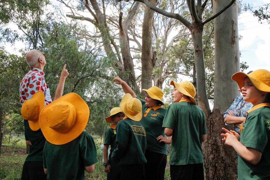 Students of Dalveen State School show Dr Karl where they set up a camera trap.