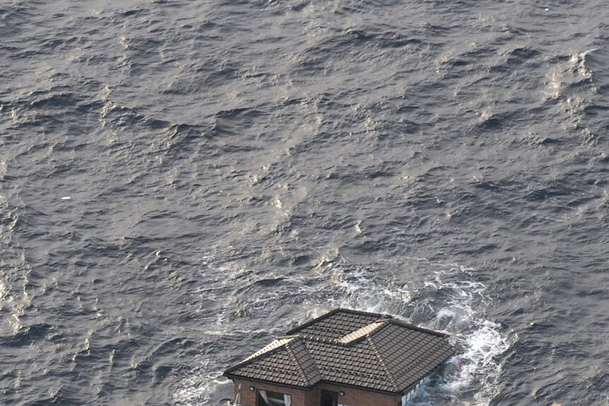 Japanese home adrift in ocean