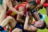 Gold Coast Suns and Fremantle AFL players get involved in a melee.