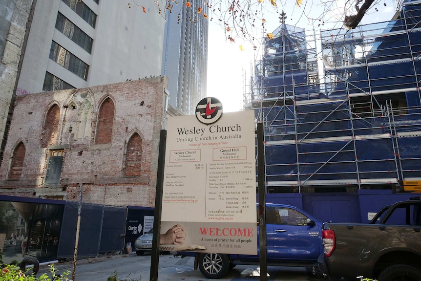 A large city construction site, with a Wesley Church sign out the front