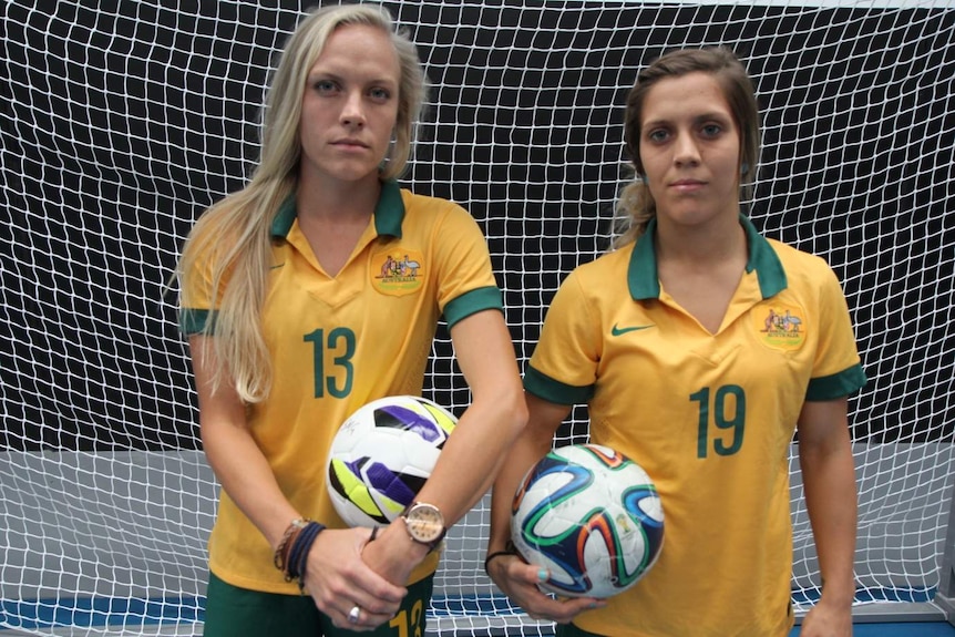 Matildas midfielders Tameka Butt (left) and Katrina Gorry (right)