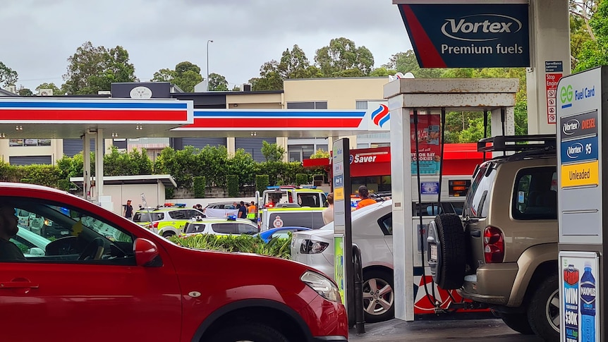 emergency vehicles at service station