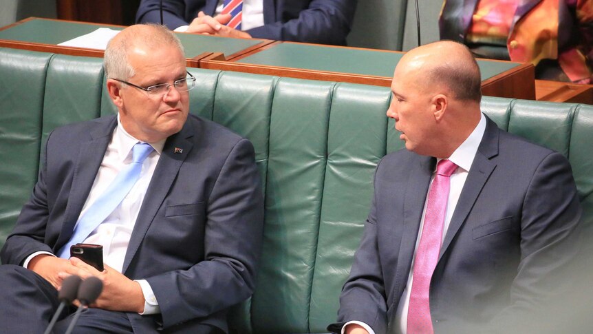 Scott Morrison and Peter Dutton in Parliament