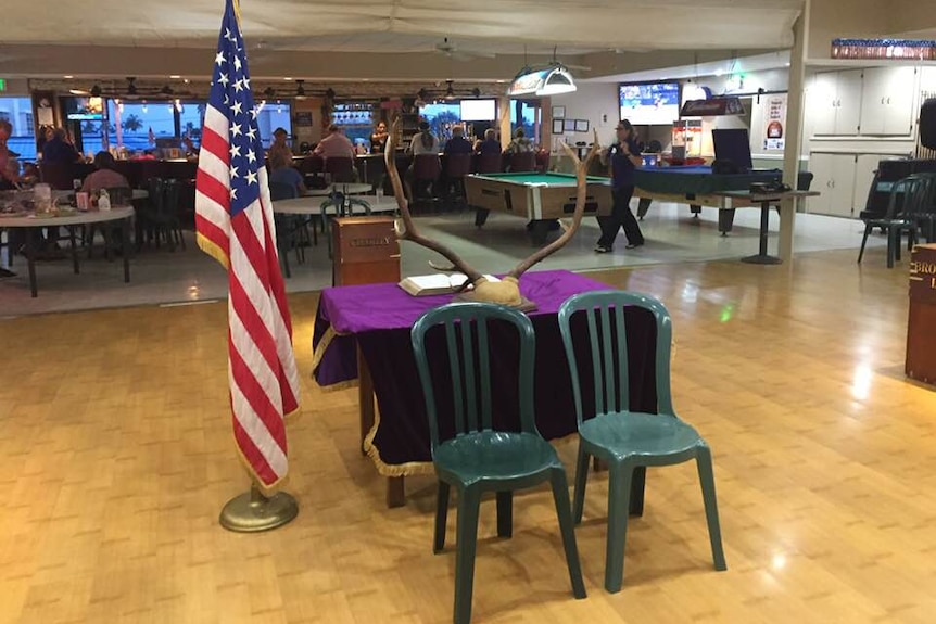 Two empty chairs at the Kona Elks Lodge, Hawaii, placed as a memorial to two chopper crash victims in the Whitsundays