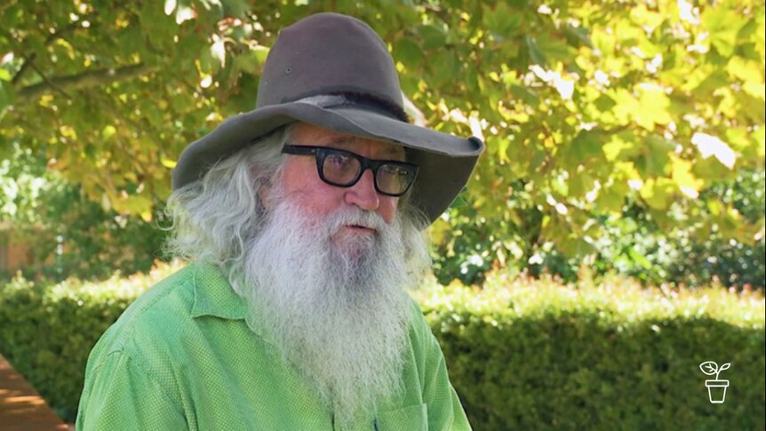 Man wearing hat outdoors