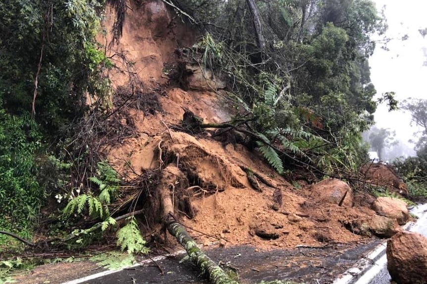 Rocks and boulders block road